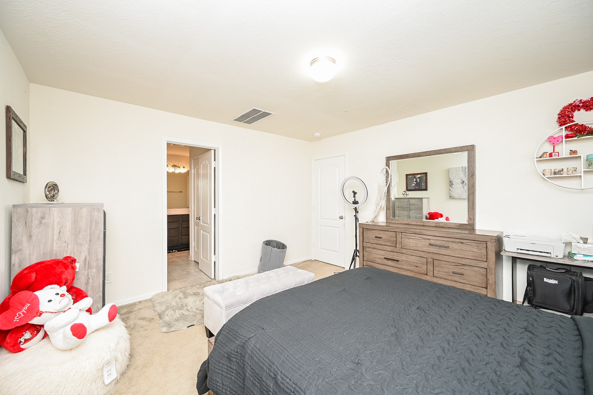 5238 Pine Forest Ridge Street Katy, TX 77493 - Photo 13 of 26 a bedroom with a bed and a dresser