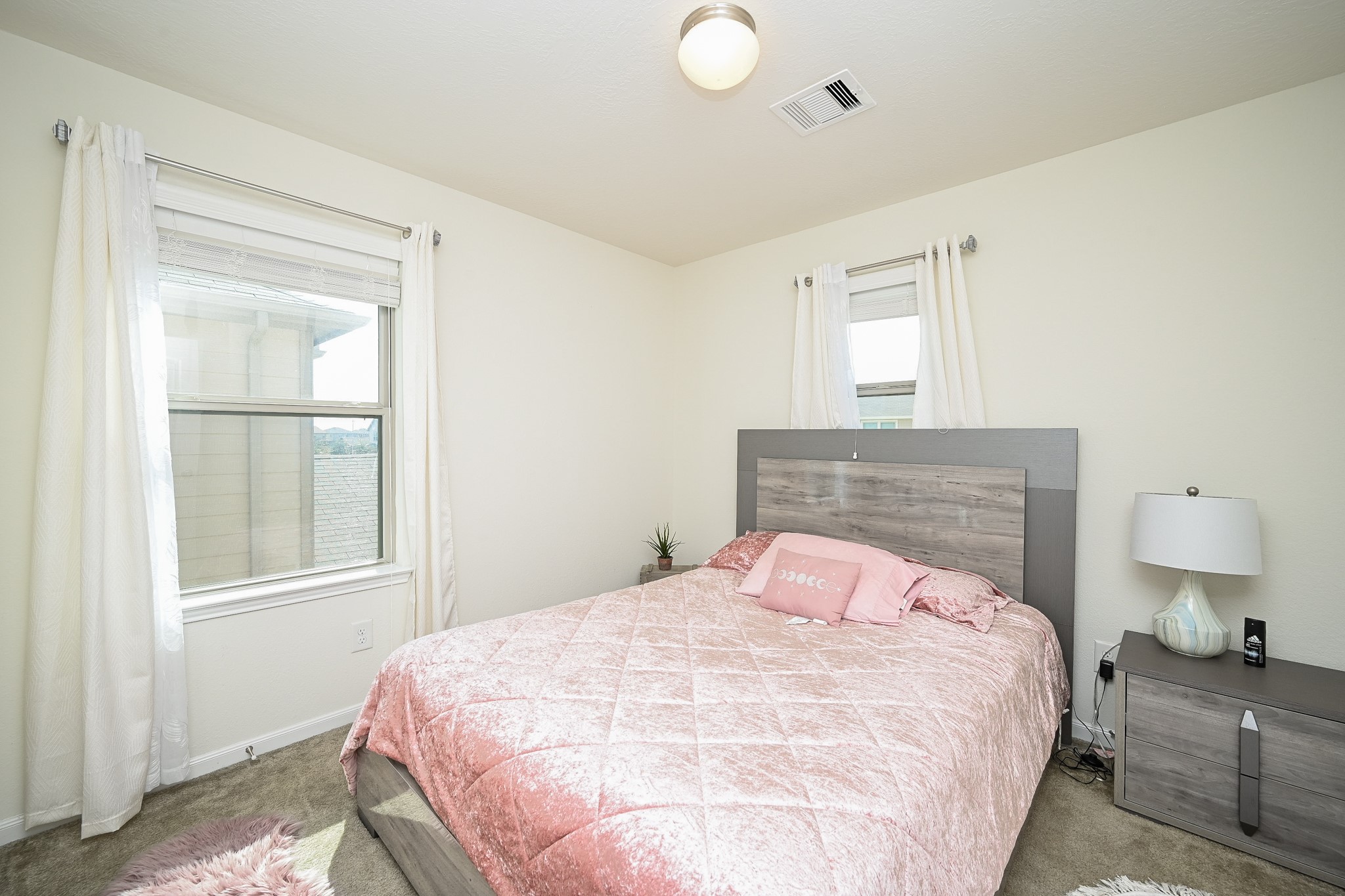 5238 Pine Forest Ridge Street Katy, TX 77493 - Photo 18 of 26 a bedroom with a bed and a window