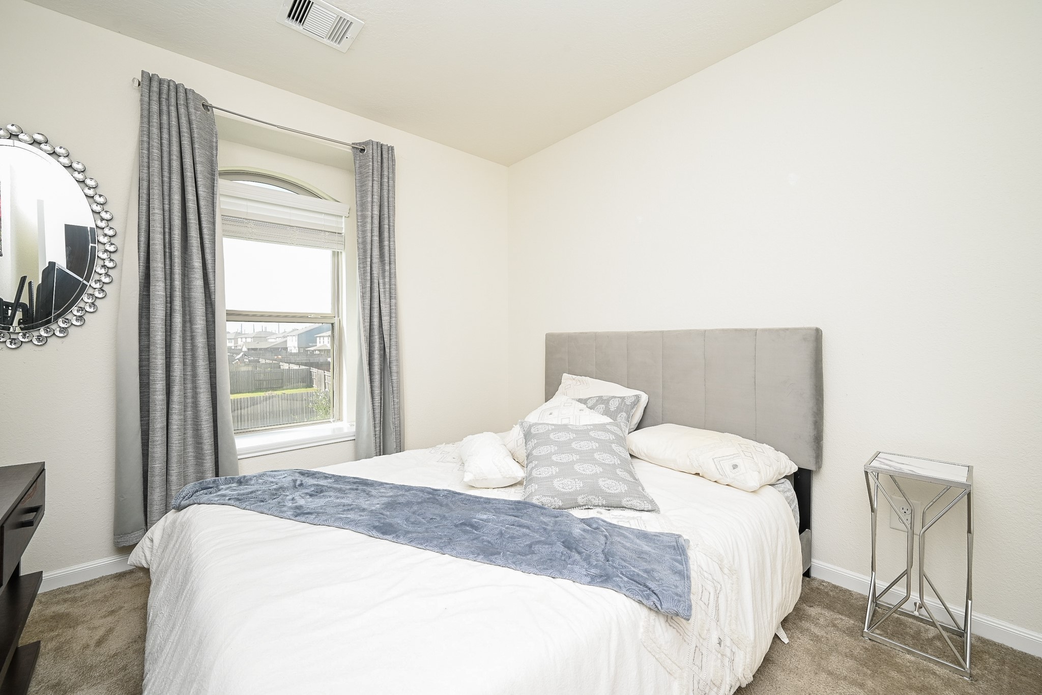 5238 Pine Forest Ridge Street Katy, TX 77493 - Photo 20 of 26 a bedroom with a bed and a window