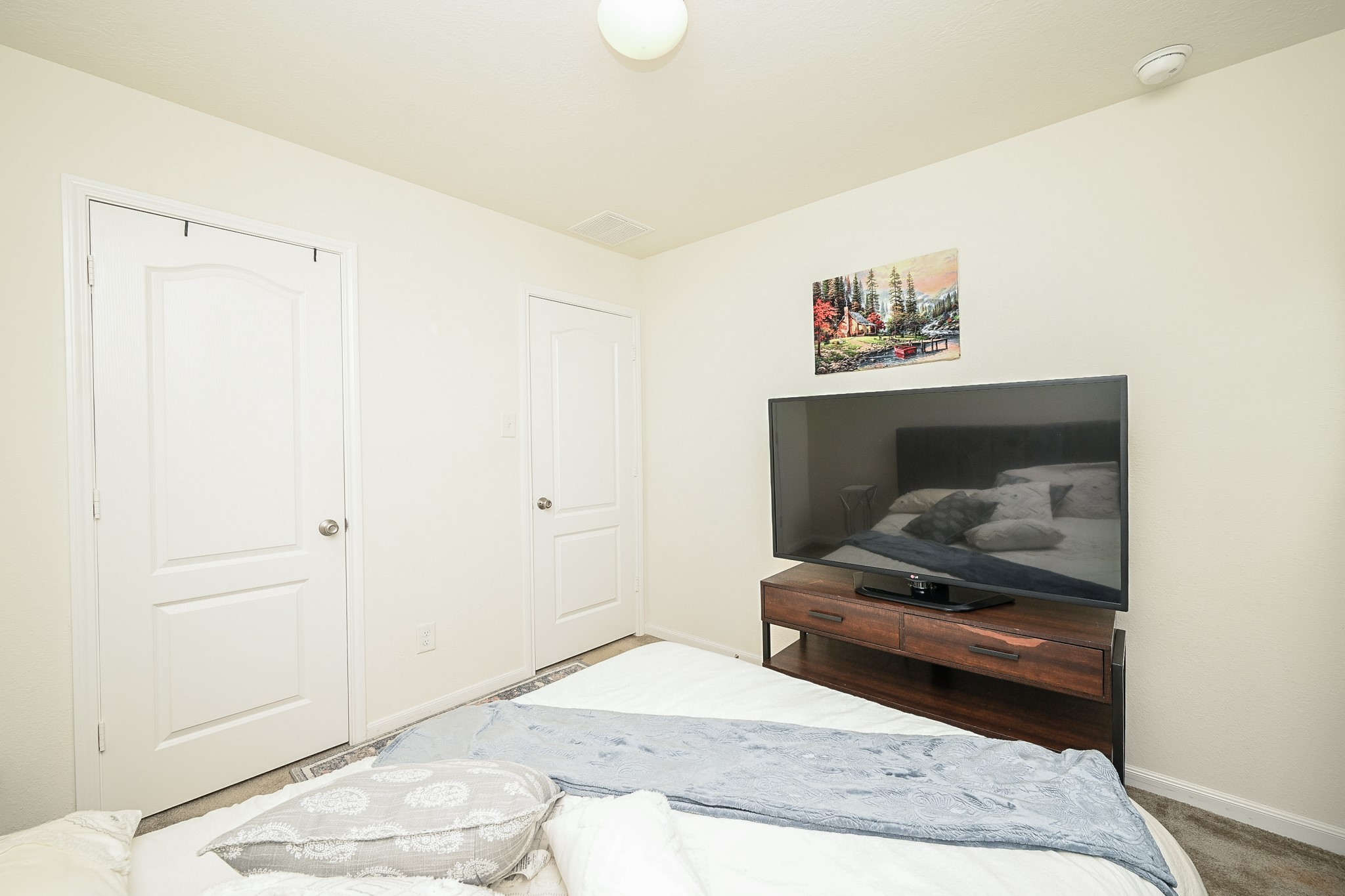 5238 Pine Forest Ridge Street Katy, TX 77493 - Photo 21 of 26 a bedroom with a bed and a window