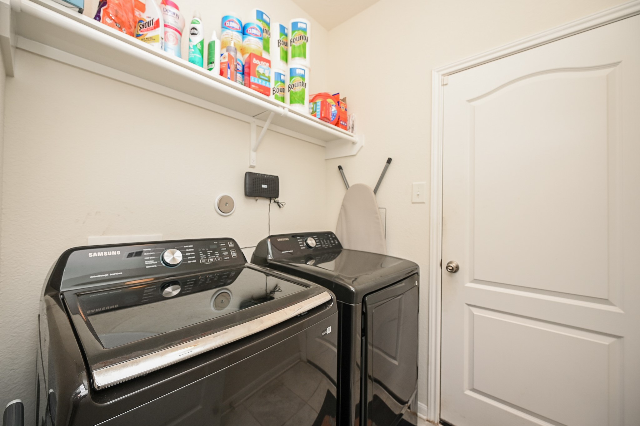 5238 Pine Forest Ridge Street Katy, TX 77493 - Photo 23 of 26 a utility room with dryer and washer
