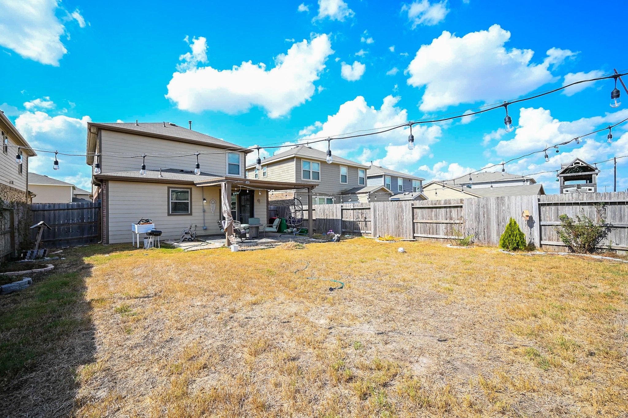 5238 Pine Forest Ridge Street Katy, TX 77493 - Photo 25 of 26 a swimming pool with yard and outdoor seating