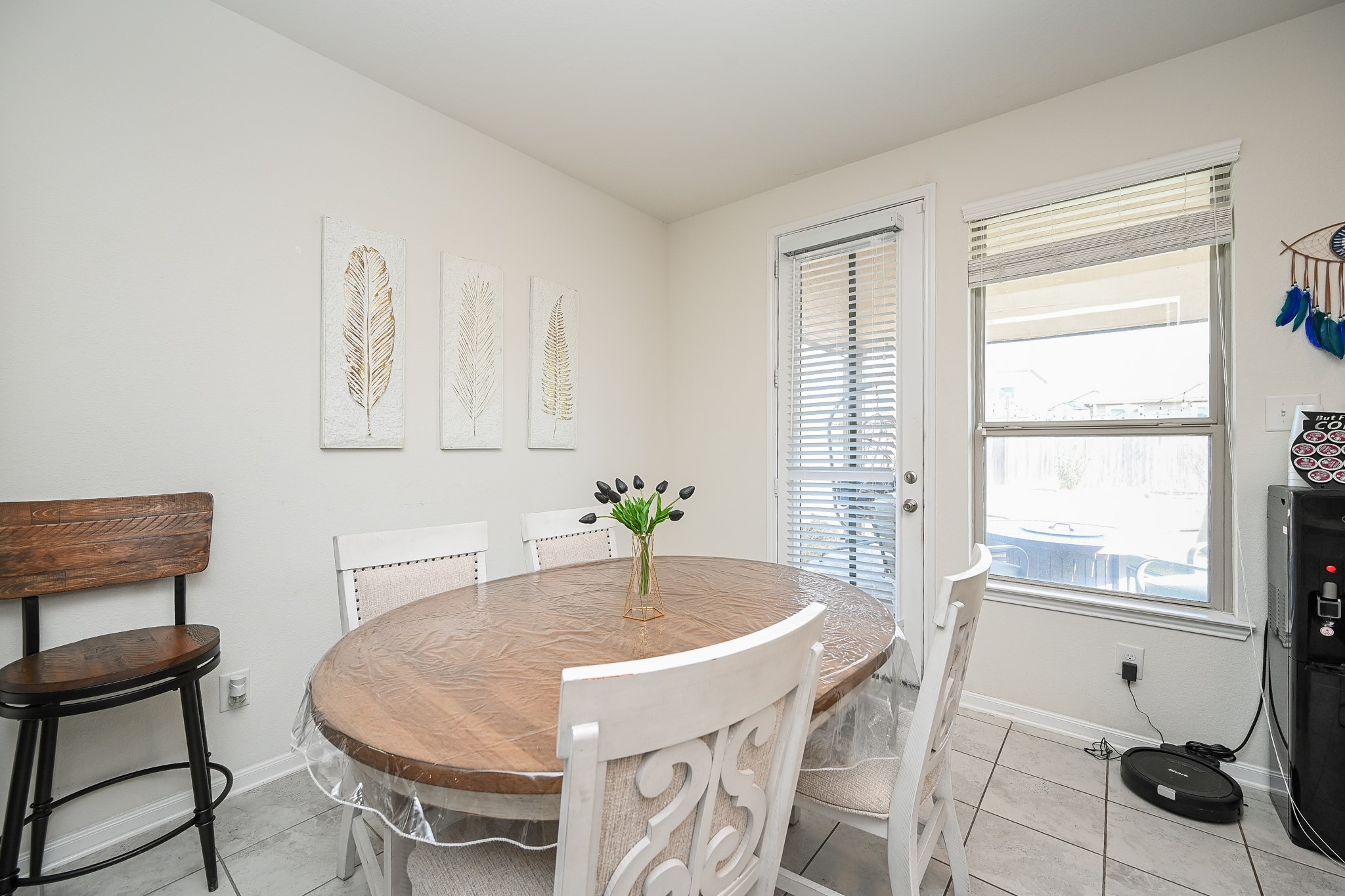5238 Pine Forest Ridge Street Katy, TX 77493 - Photo 9 of 26 a dining room with furniture and window