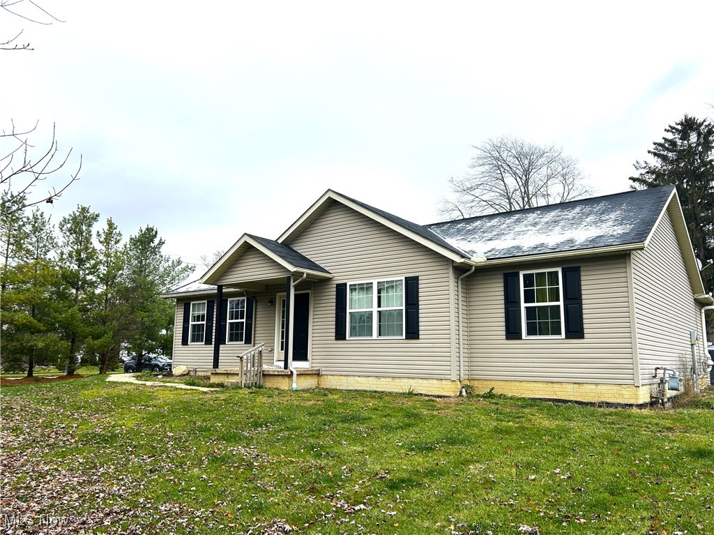5320 Boston Road Brunswick, OH 44212 - Photo 1 of 18 Single story home featuring a front yard and a small entry porch