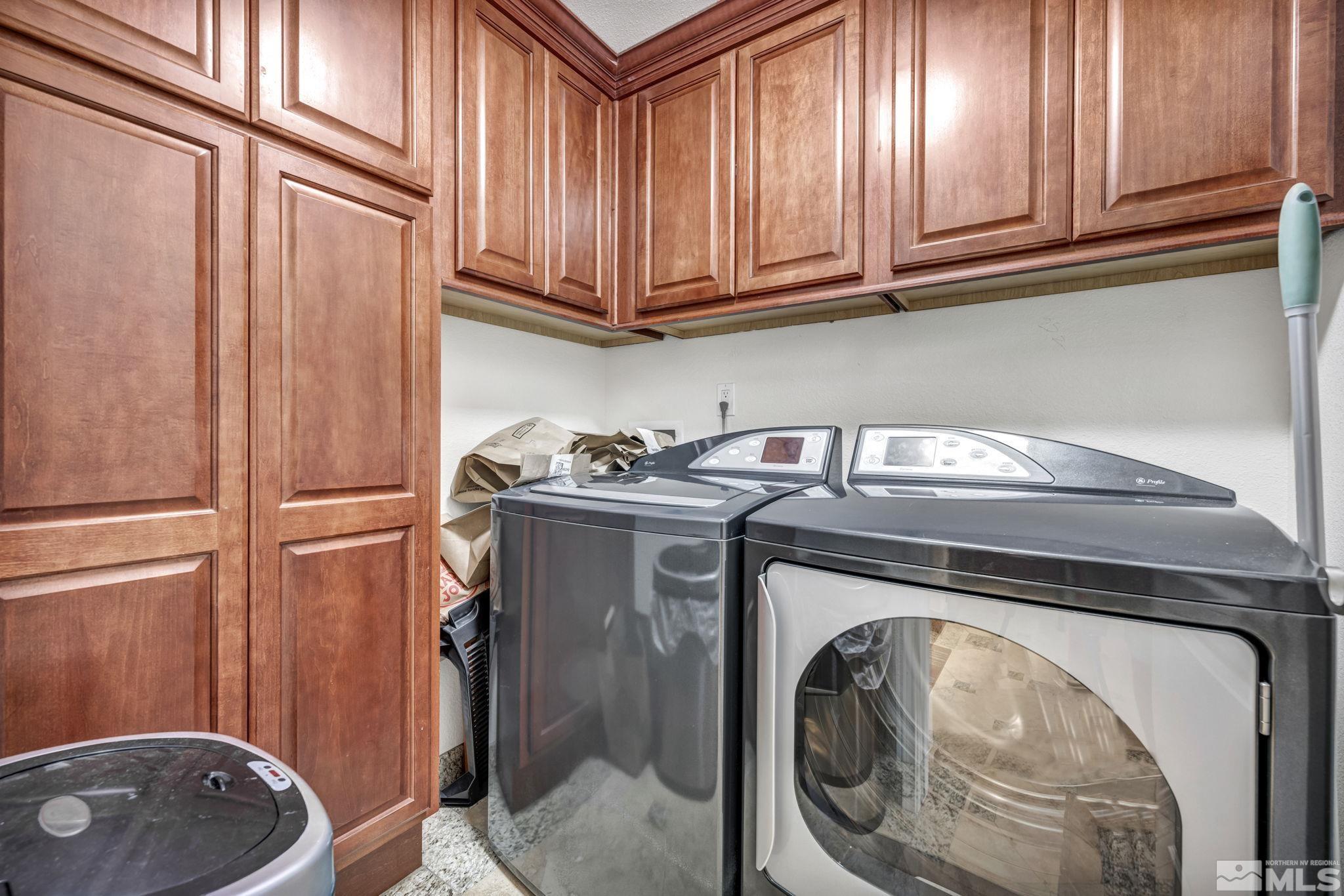 200 West 2nd Street, Unit 1207 Reno, NV 89501 - Photo 7 of 39 a utility room with dryer and washer