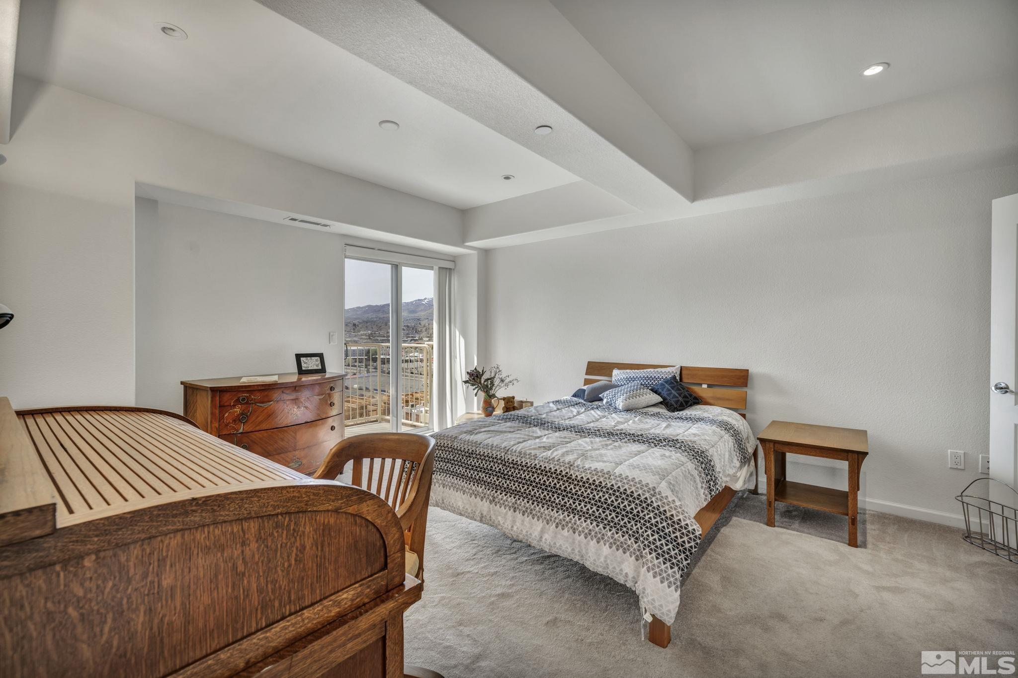 200 West 2nd Street, Unit 1207 Reno, NV 89501 - Photo 8 of 39 a bedroom with two beds and a table