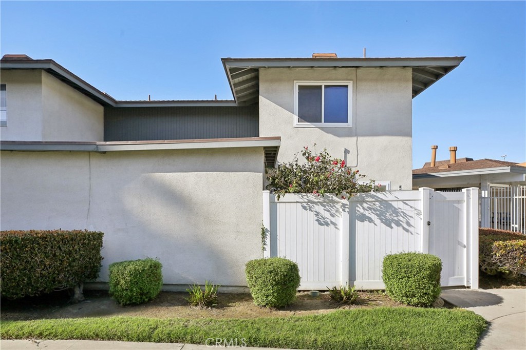 4018 Bryant Court Cypress, CA 90630 - Photo 11 of 16 a front view of a house with garden