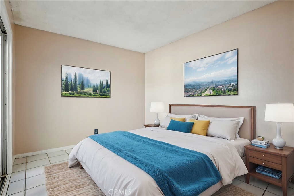 4018 Bryant Court Cypress, CA 90630 - Photo 6 of 16 a bedroom with a bed and a painting on the wall