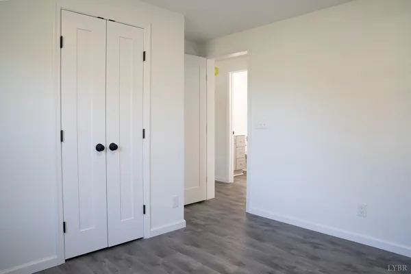 a view of a livingroom with wooden floor
