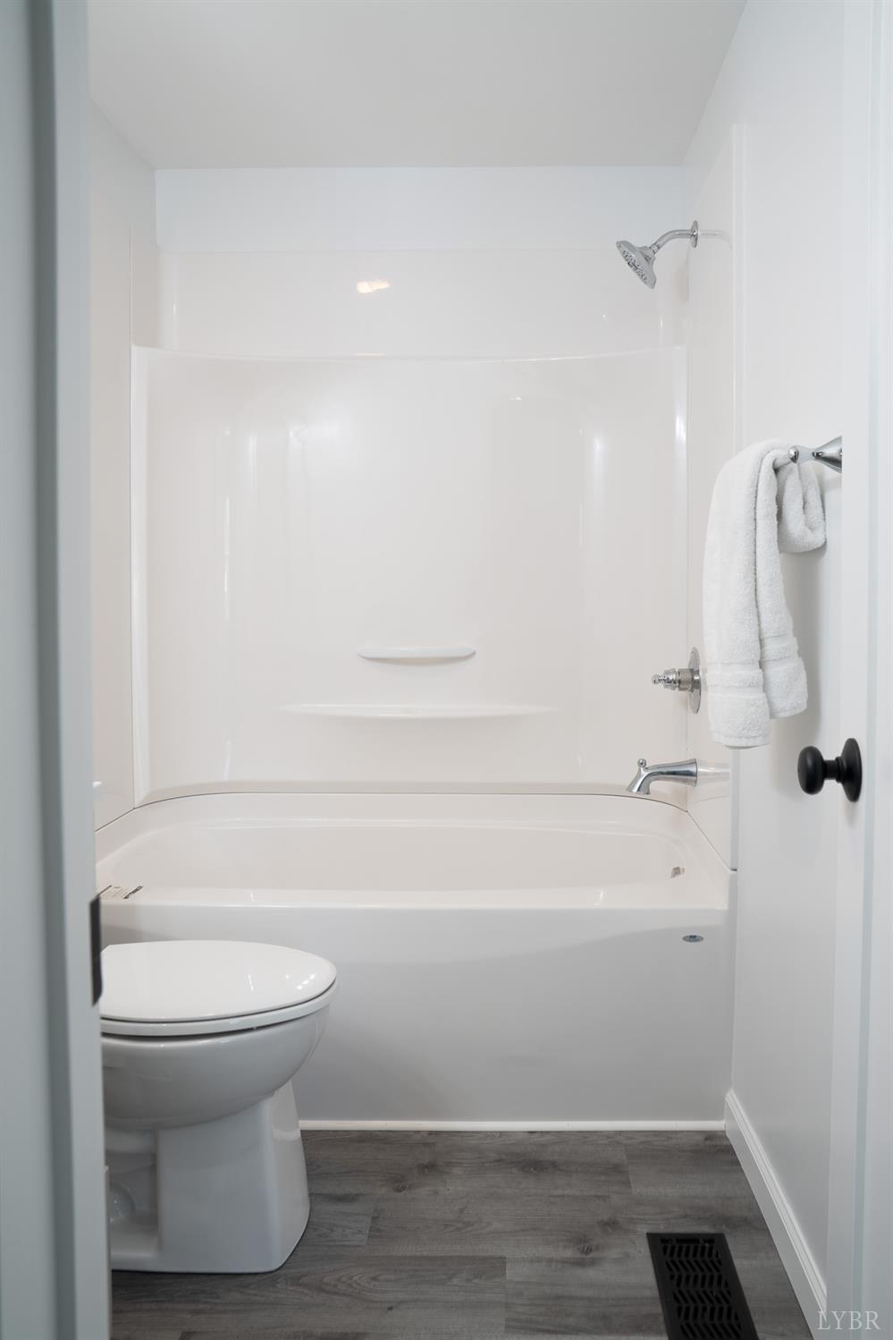 405 Spring Mill Road Concord, VA 24538 - Photo 23 of 28 a bathroom with a toilet and a shower
