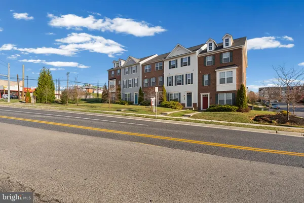 a view of a building with a street