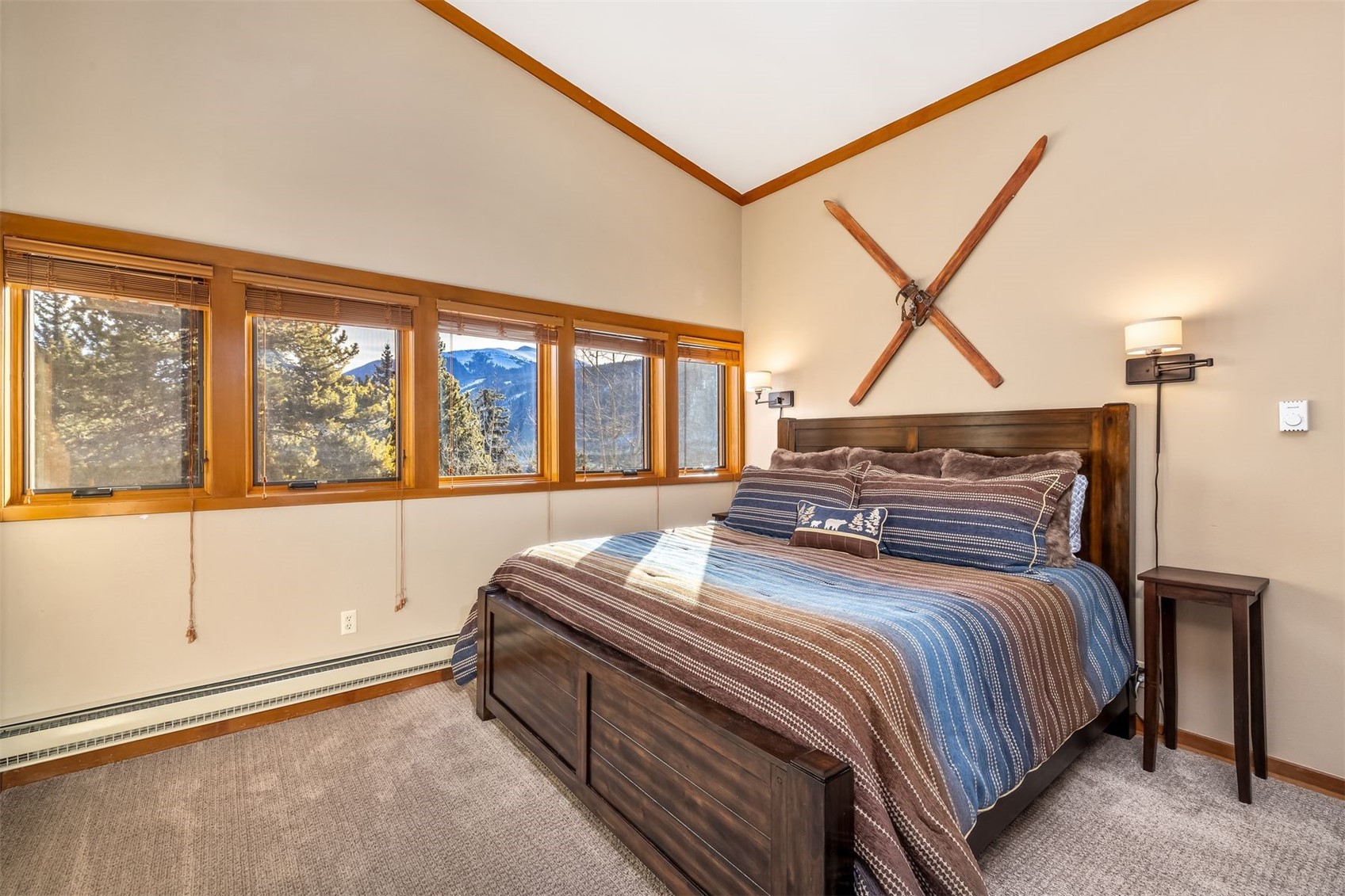 410 Tennis Club Road, Unit 1317 Keystone, CO 80435 - Photo 11 of 42 a bedroom with a bed and a large window
