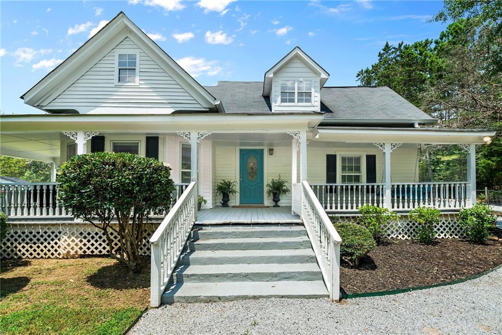 a front view of a house with a porch