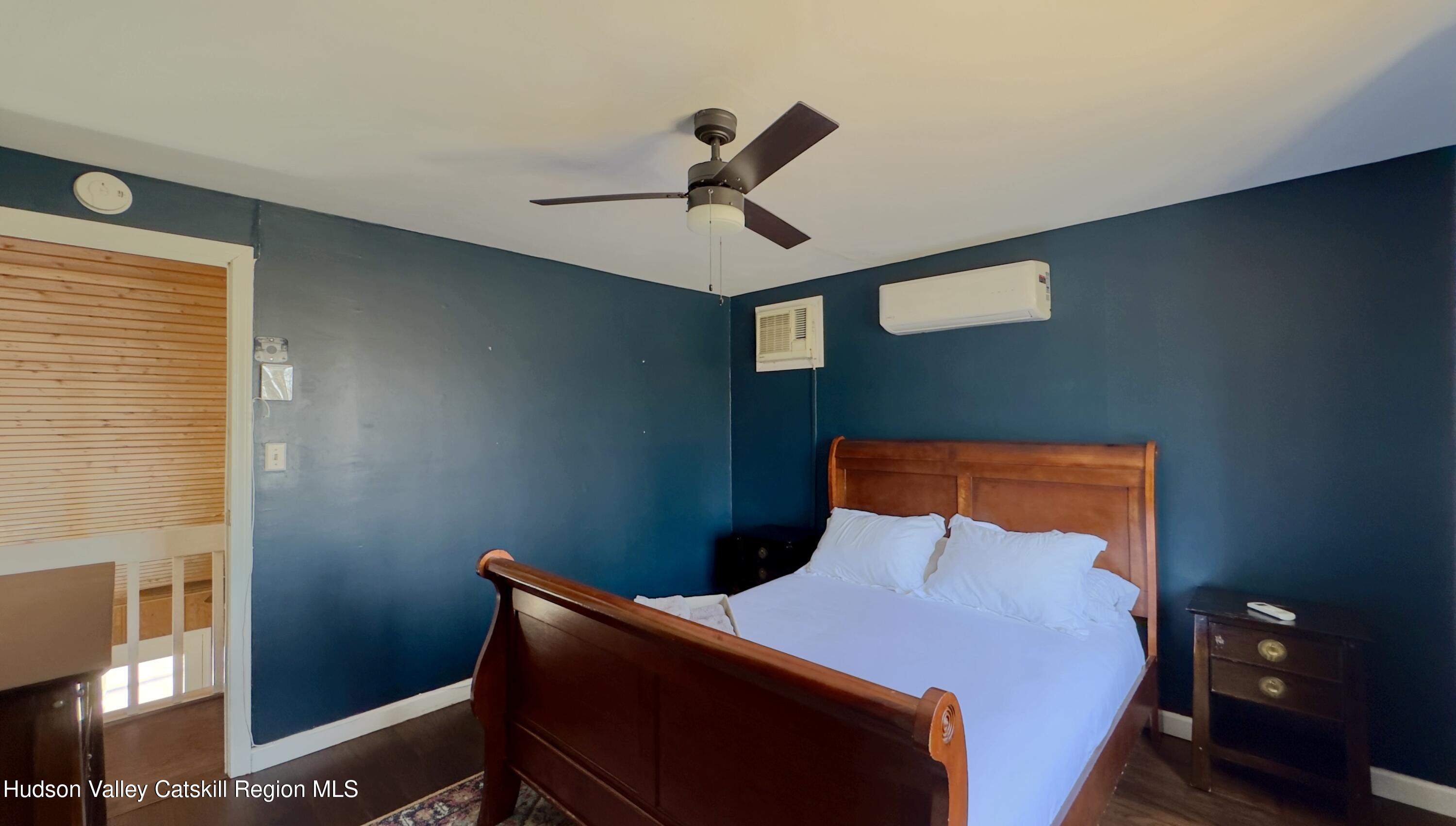87 Sleepy Hollow Road Athens, NY 12015 - Photo 21 of 42 a bed room with a bed and a window