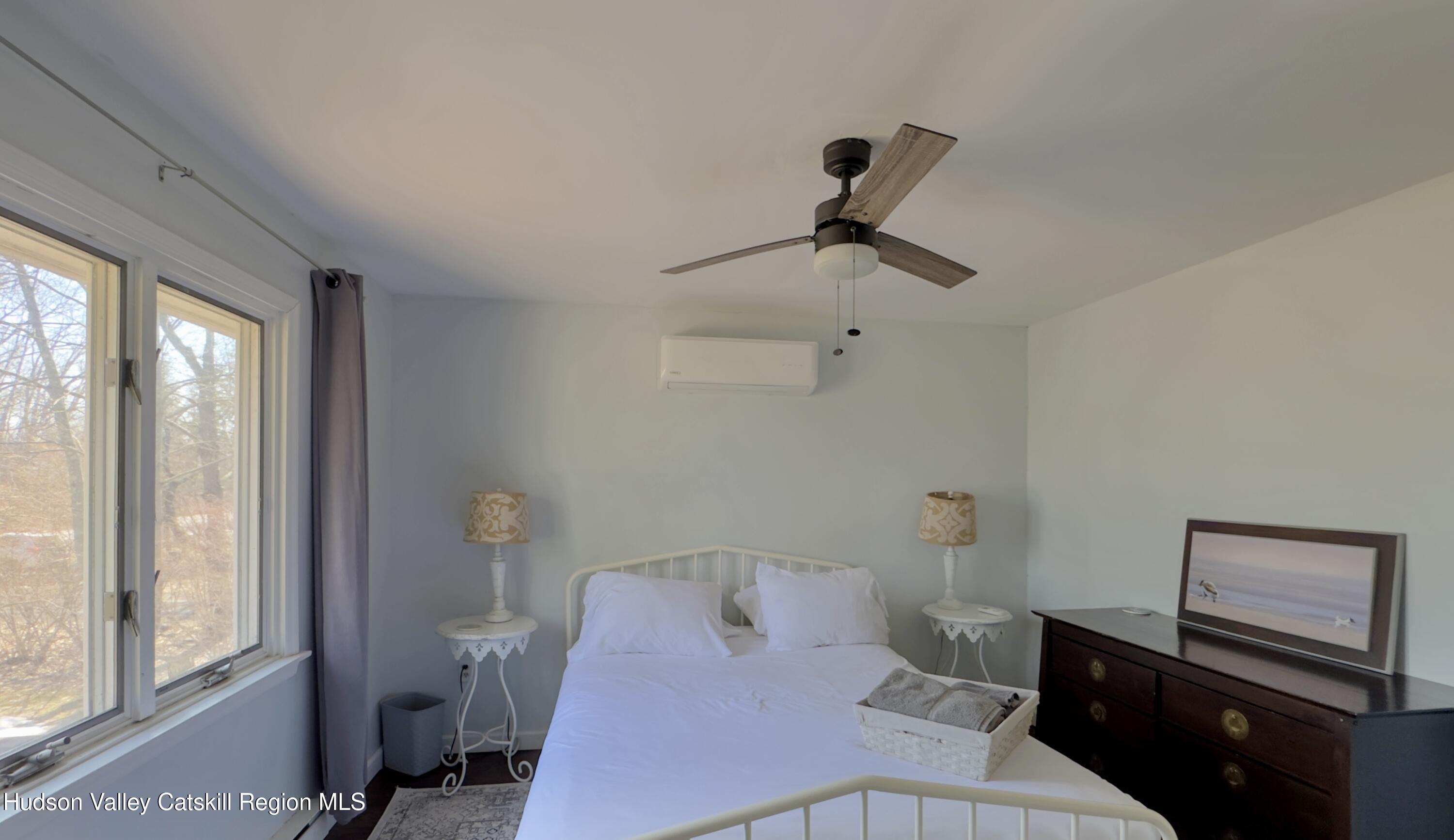 87 Sleepy Hollow Road Athens, NY 12015 - Photo 23 of 42 a bathroom with a toilet a sink and a mirror