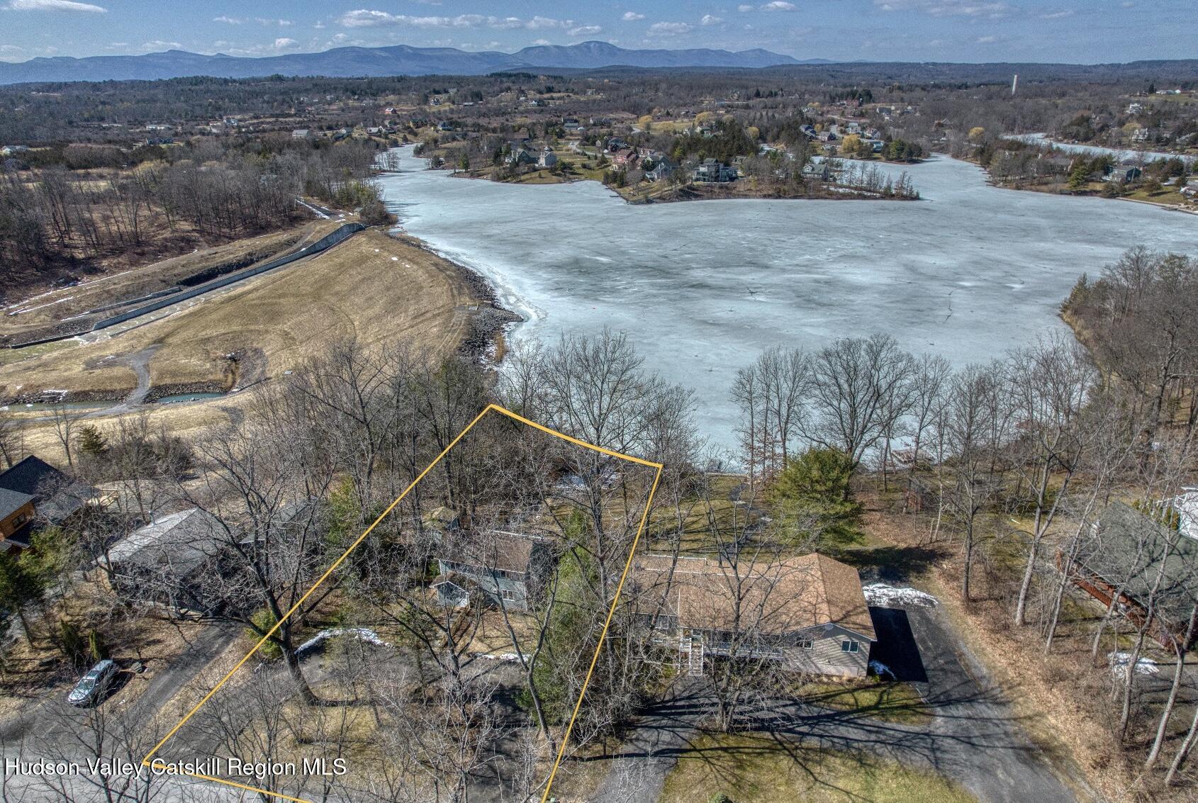 87 Sleepy Hollow Road Athens, NY 12015 - Photo 3 of 42 a view of a dry yard with wooden fence