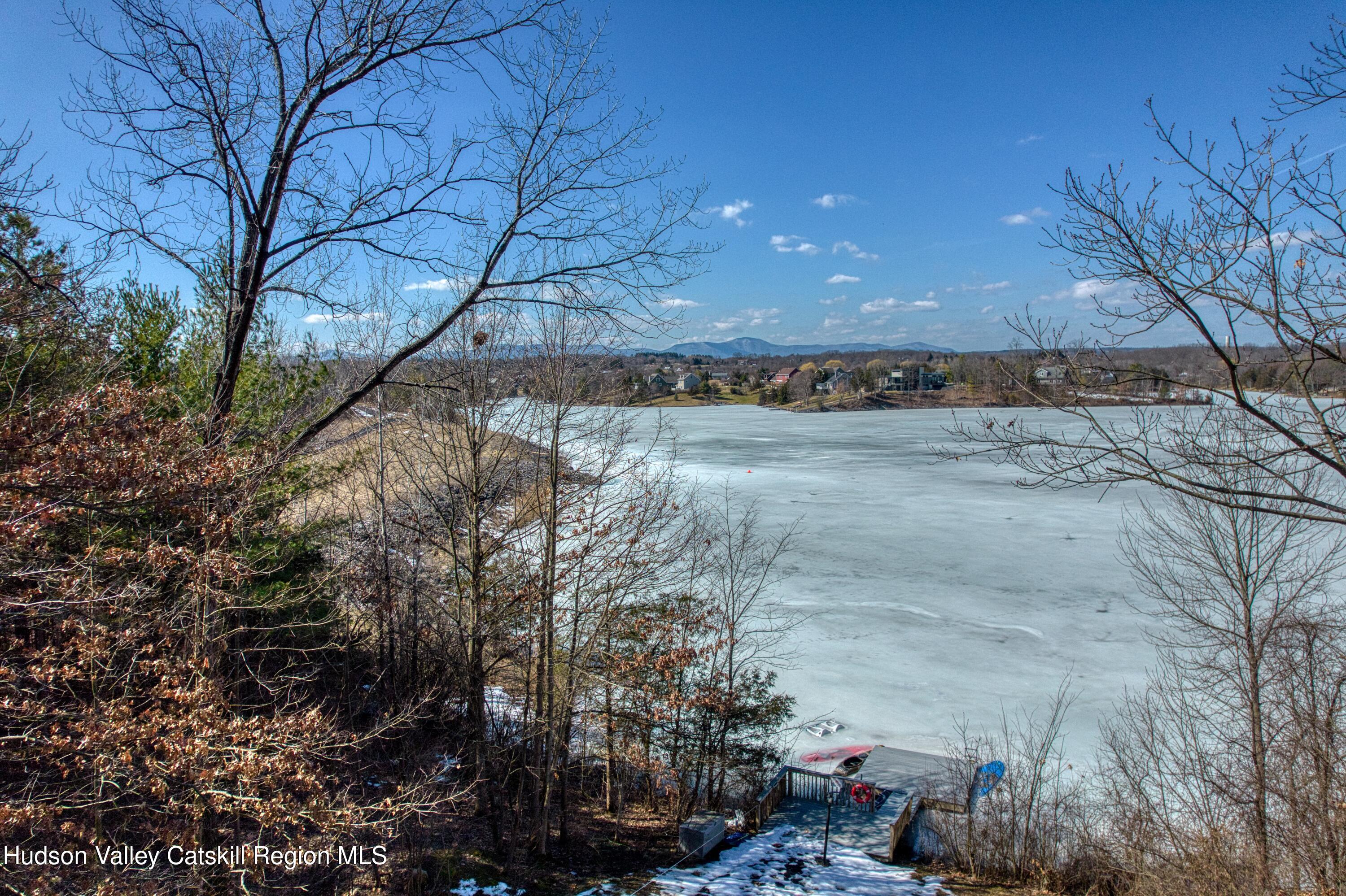 87 Sleepy Hollow Road Athens, NY 12015 - Photo 4 of 42 a view of a yard next to a road