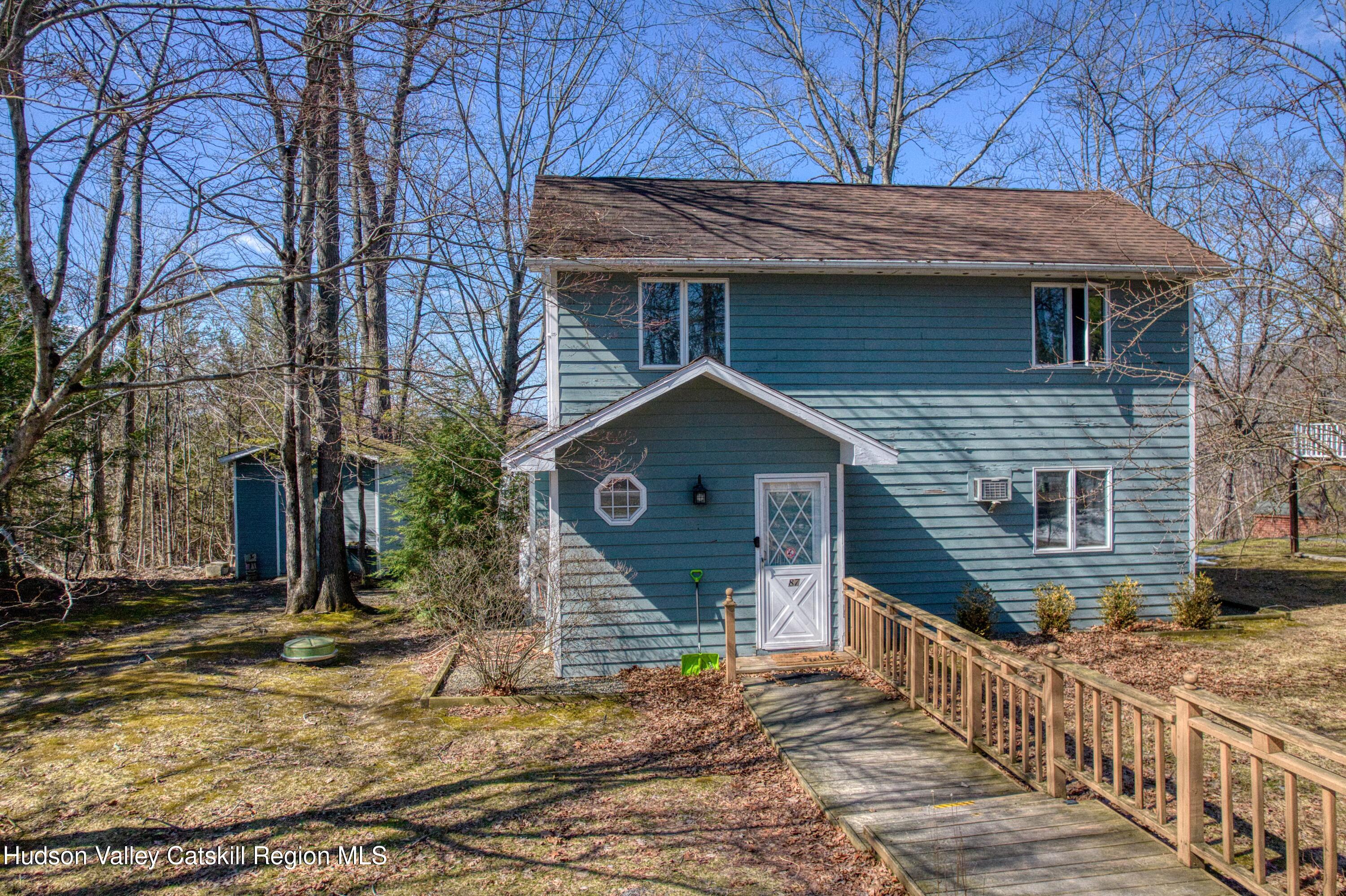 87 Sleepy Hollow Road Athens, NY 12015 - Photo 5 of 42 a front view of a house with a yard