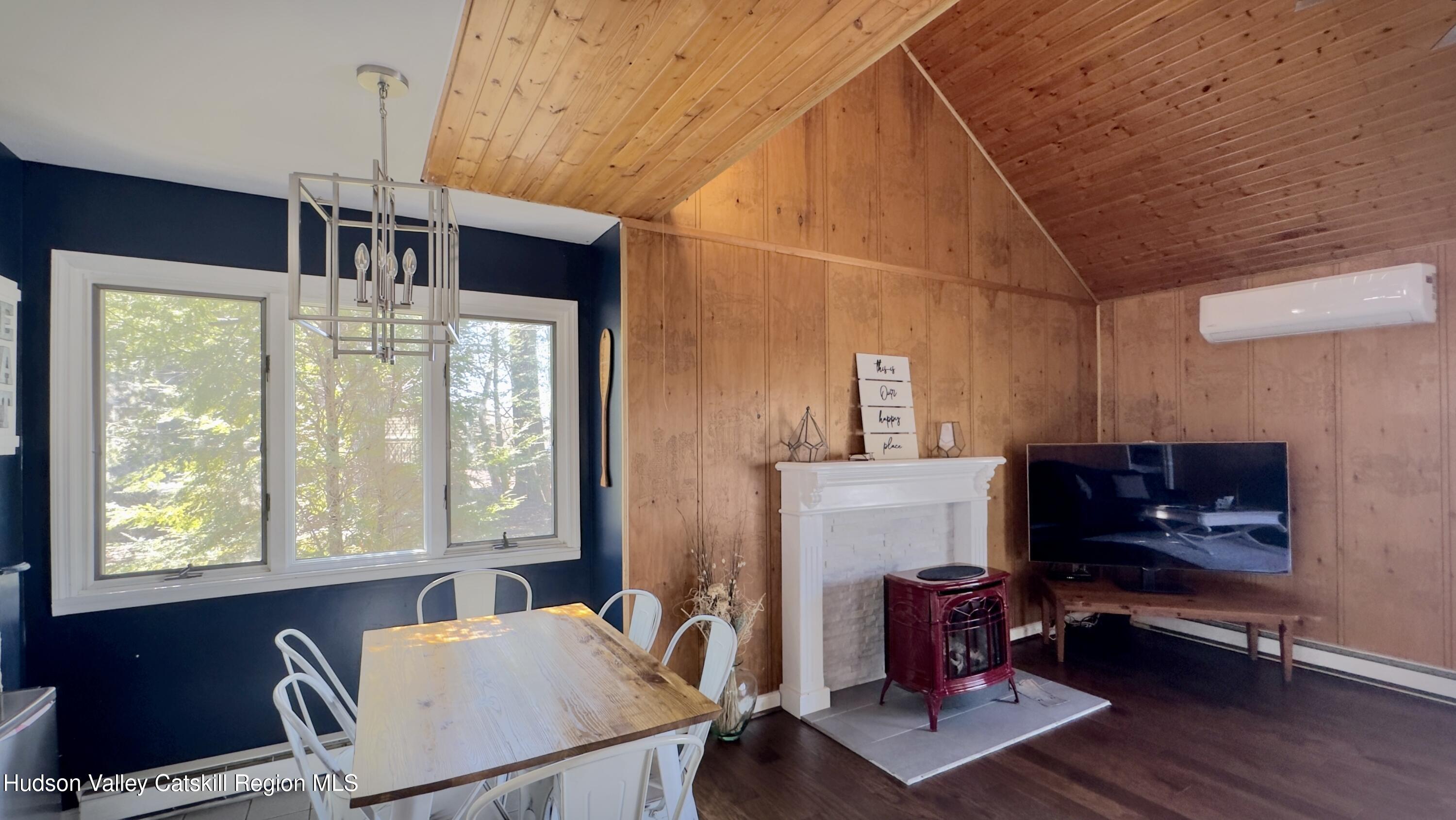87 Sleepy Hollow Road Athens, NY 12015 - Photo 9 of 42 a living room with furniture and a window