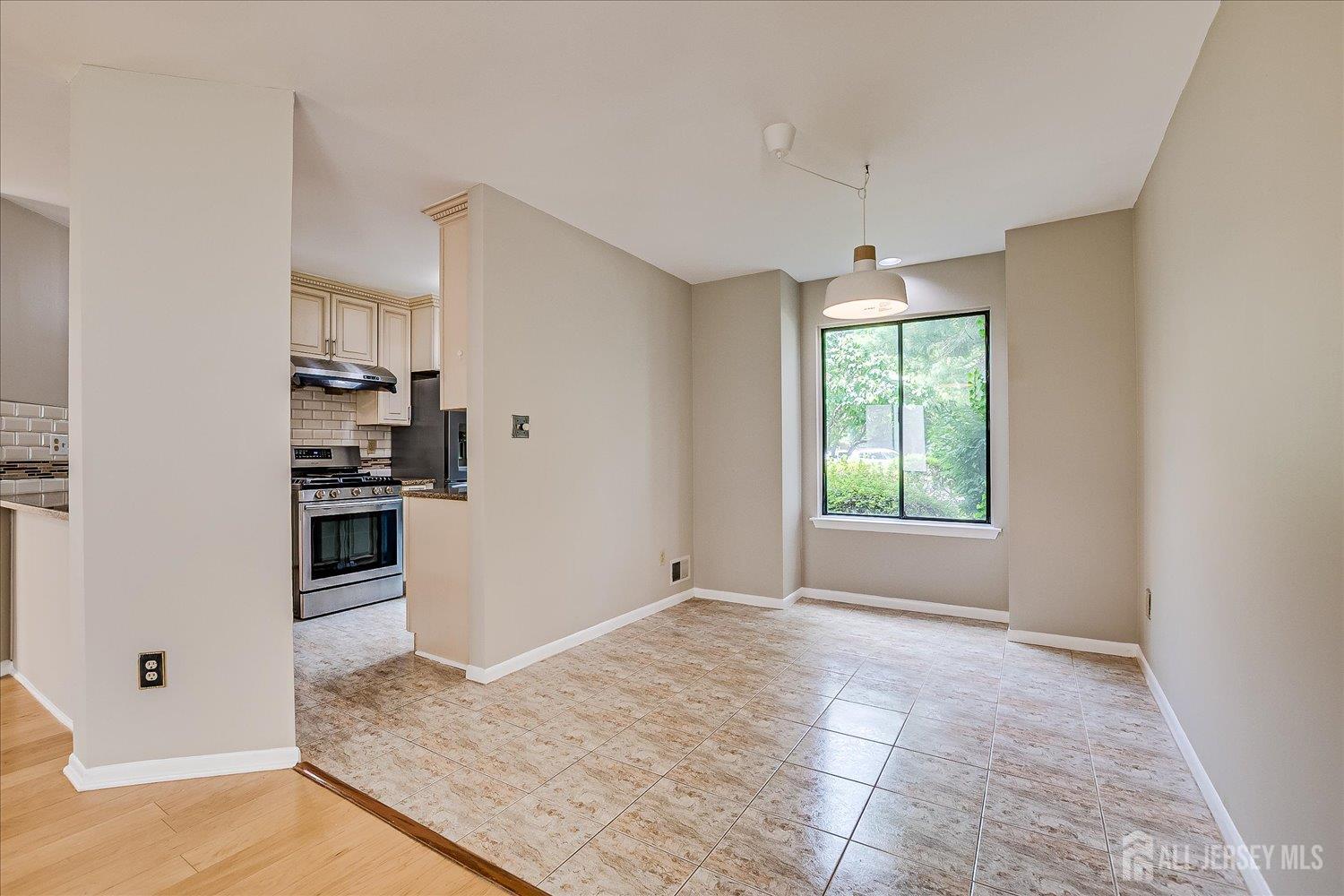 83 Park Gate Drive Edison, NJ 08820 - Photo 20 of 35 a view of a kitchen with microwave and refrigerator