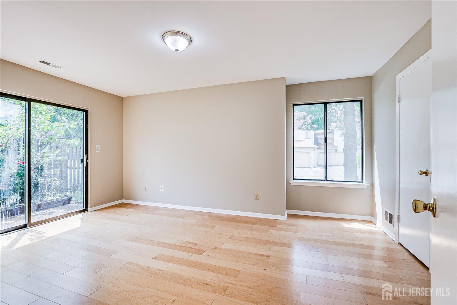 83 Park Gate Drive Edison, NJ 08820 - Photo 22 of 35 a view of an empty room with a window