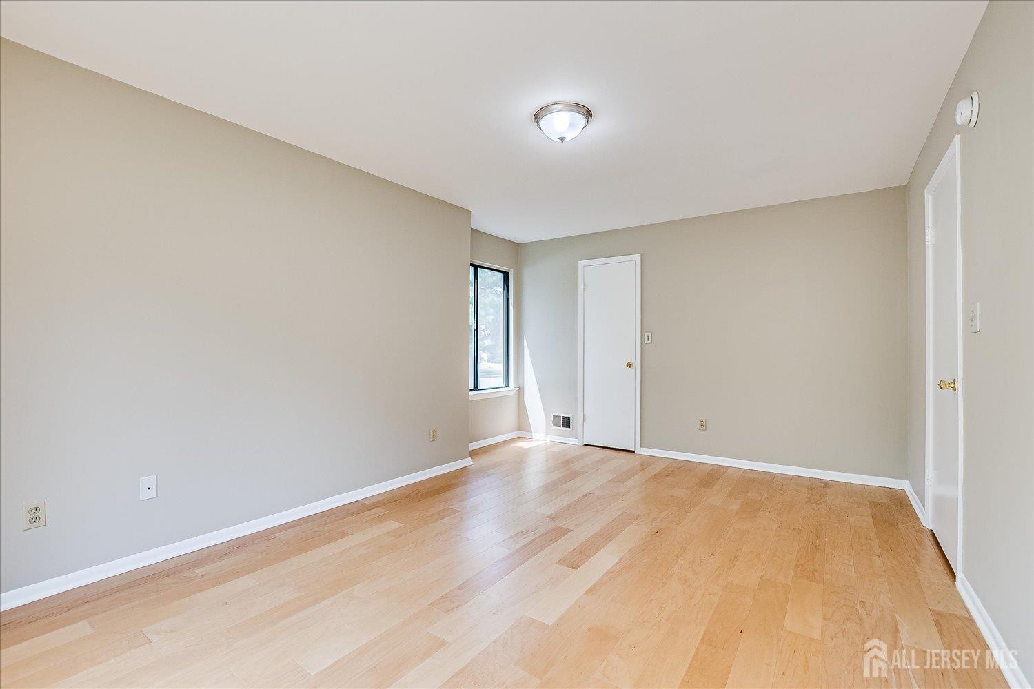 83 Park Gate Drive Edison, NJ 08820 - Photo 24 of 35 a view of an empty room