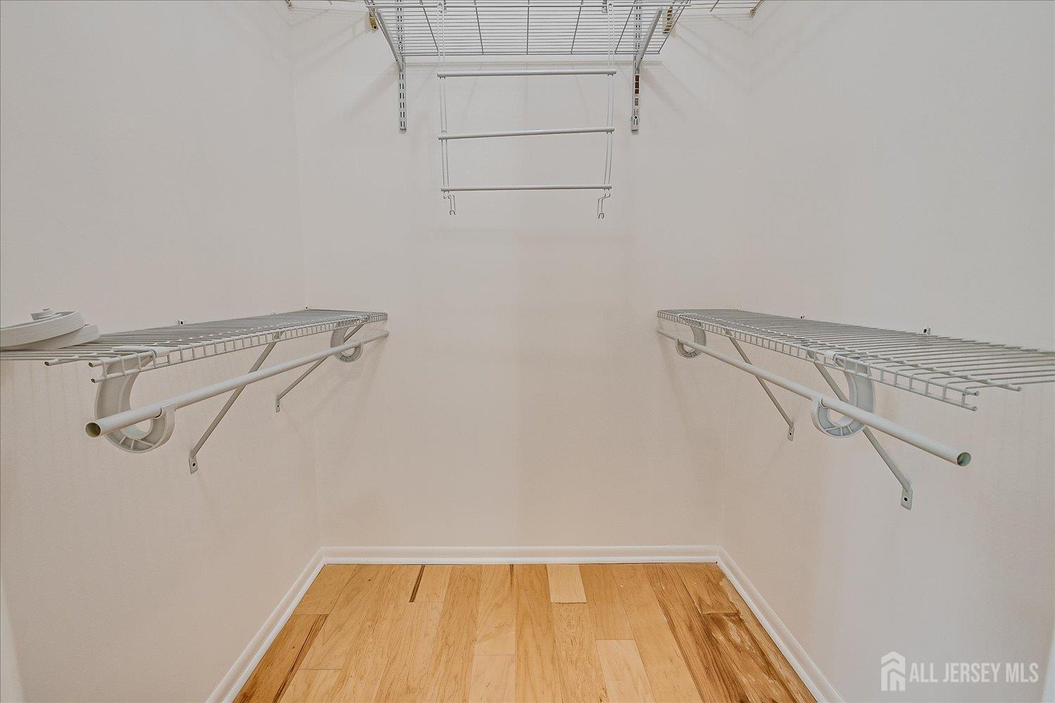 83 Park Gate Drive Edison, NJ 08820 - Photo 25 of 35 a view of a room with racks on the wall