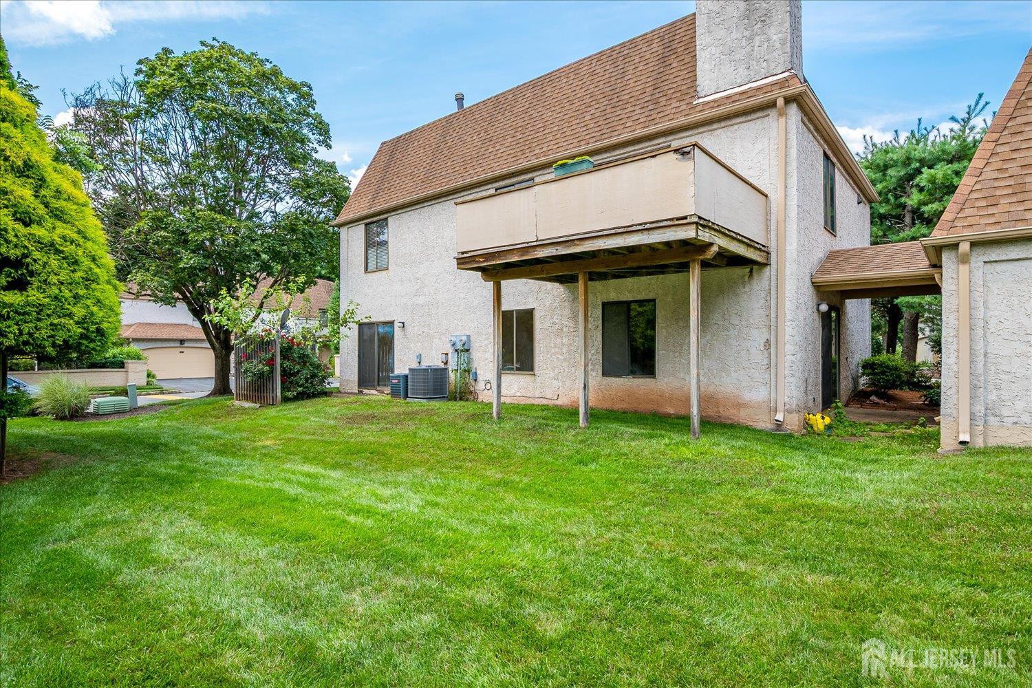 83 Park Gate Drive Edison, NJ 08820 - Photo 31 of 35 a view of a house with backyard