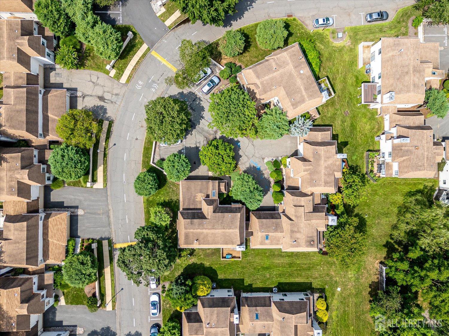 83 Park Gate Drive Edison, NJ 08820 - Photo 6 of 35 an aerial view of a house with a yard