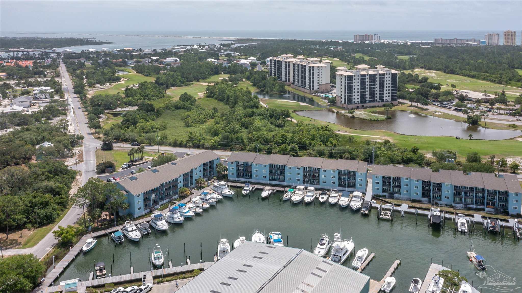 14100 River Road, Unit 122B Perdido Key, FL 32507 - Photo 41 of 46 an aerial view of a house with a ocean view