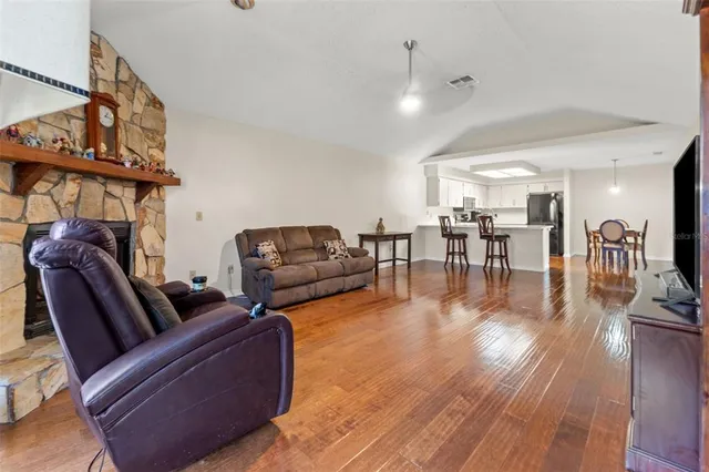 a living room with furniture and a table