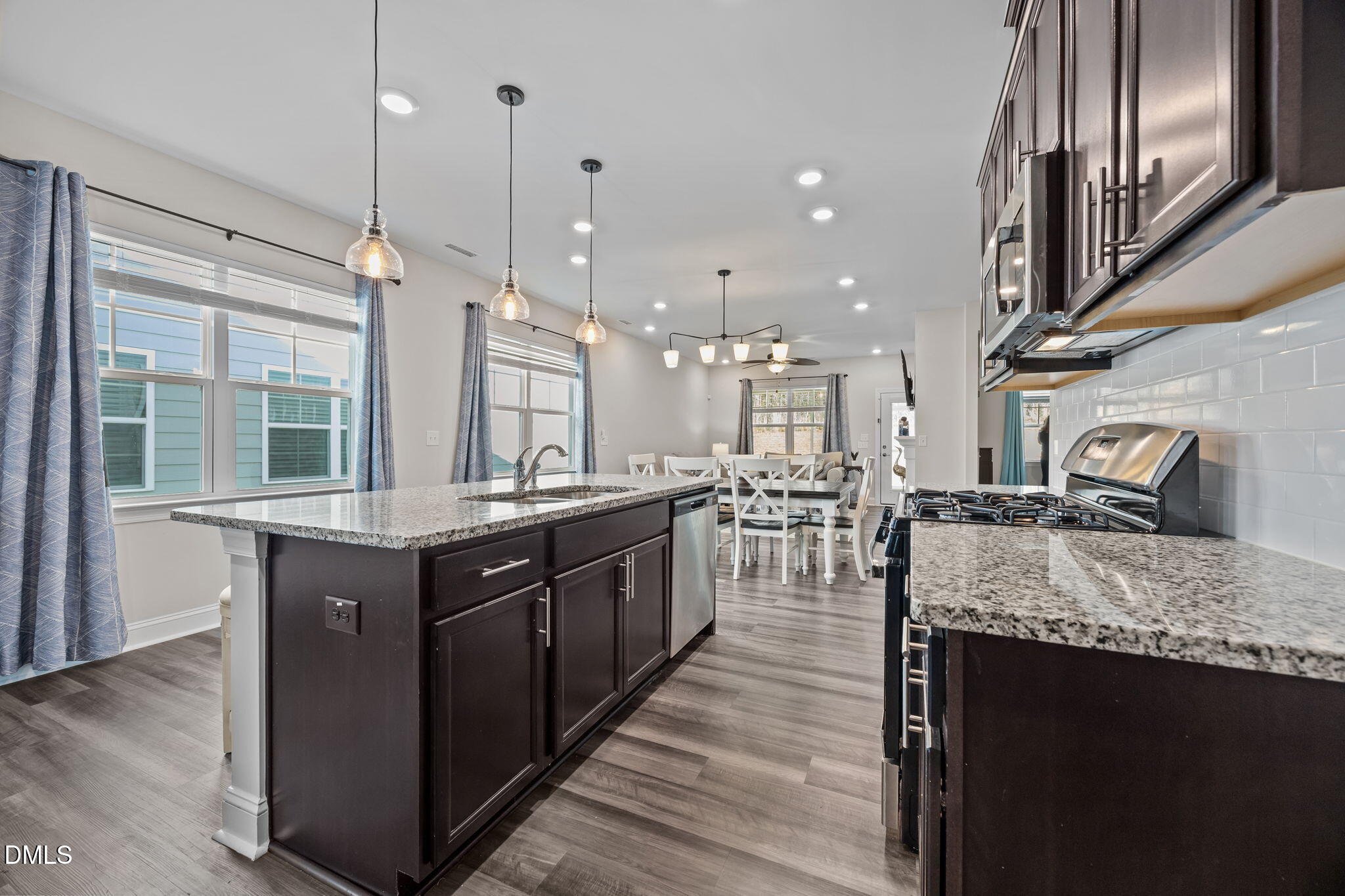 162 Desert Sand Lane Raleigh, NC 27610 - Photo 11 of 33 a large kitchen with lots of counter space and a sink