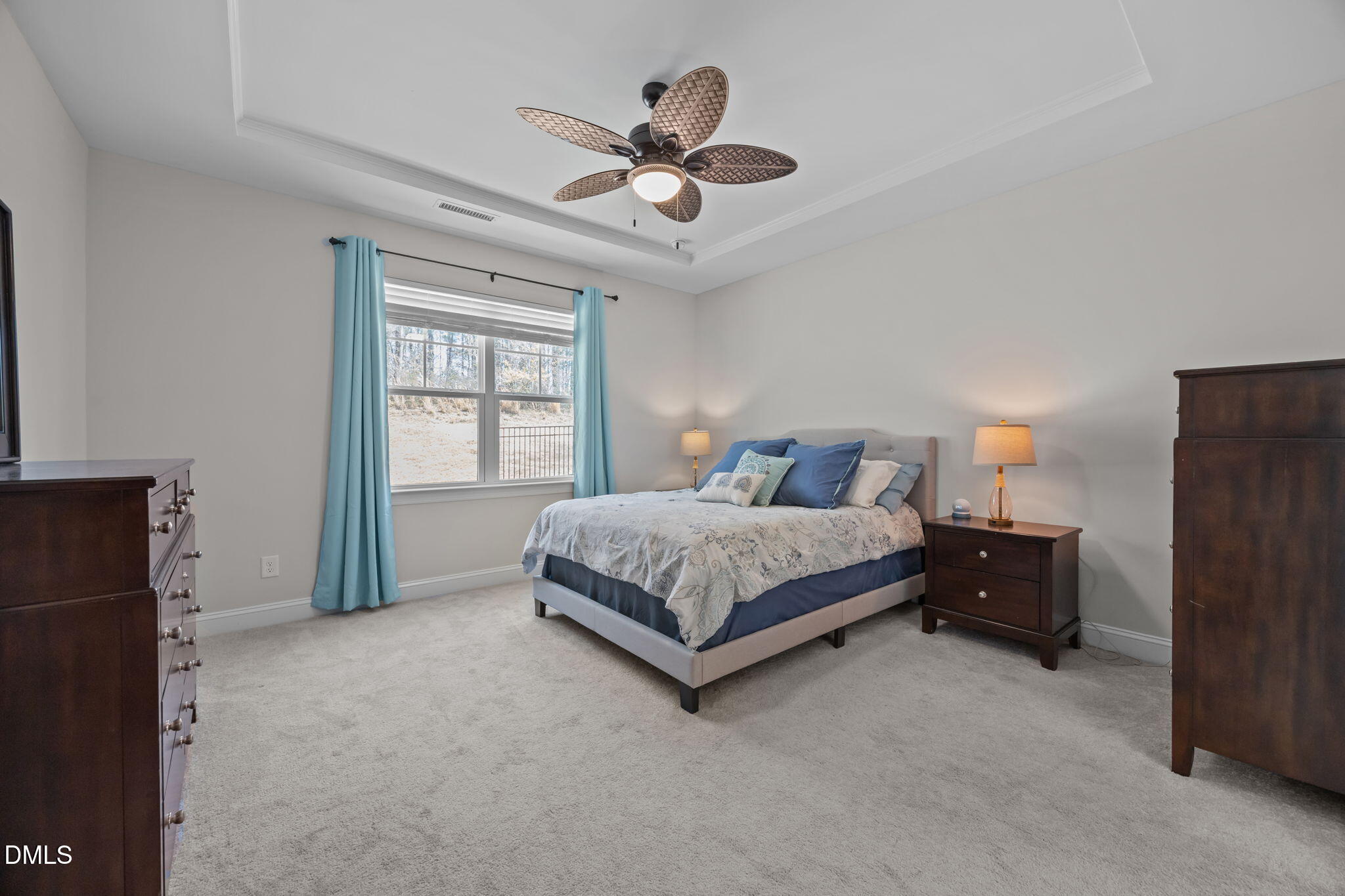 162 Desert Sand Lane Raleigh, NC 27610 - Photo 16 of 33 a bedroom with a bed and window