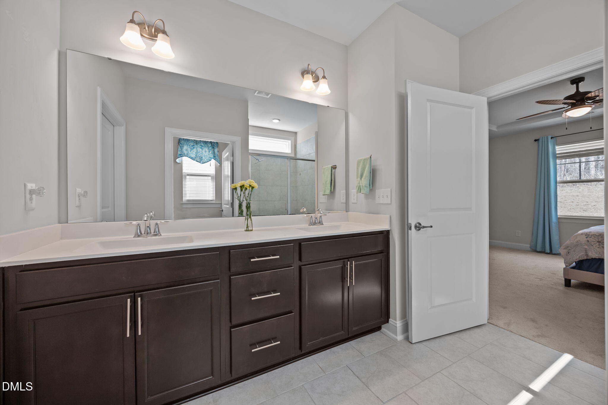 162 Desert Sand Lane Raleigh, NC 27610 - Photo 19 of 33 a spacious bathroom with a granite countertop sink mirror and