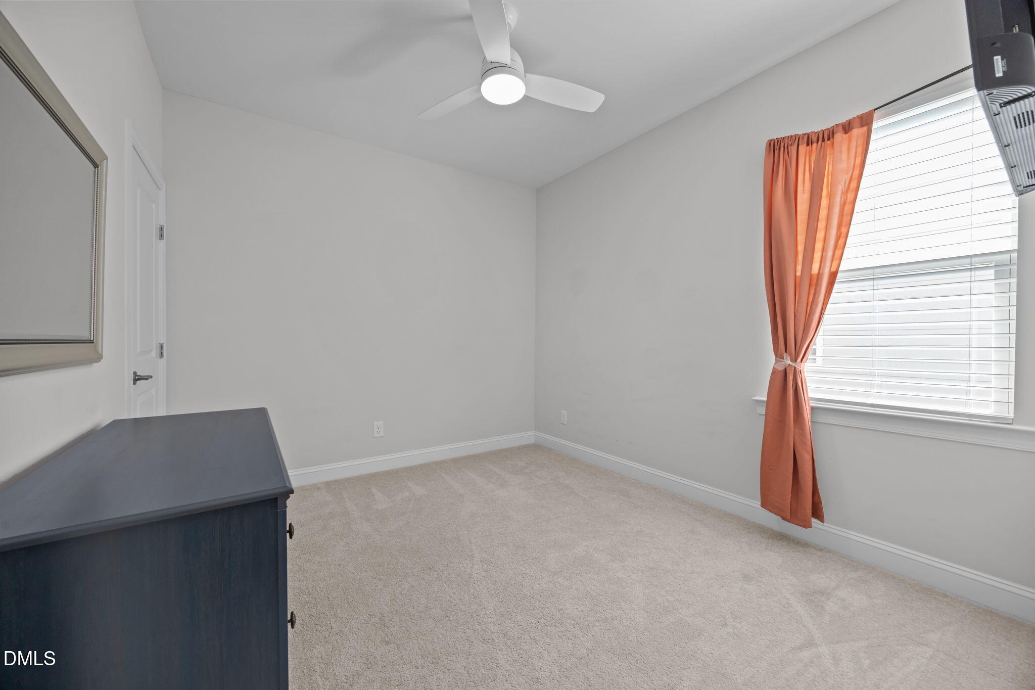 162 Desert Sand Lane Raleigh, NC 27610 - Photo 20 of 33 an empty room with a window