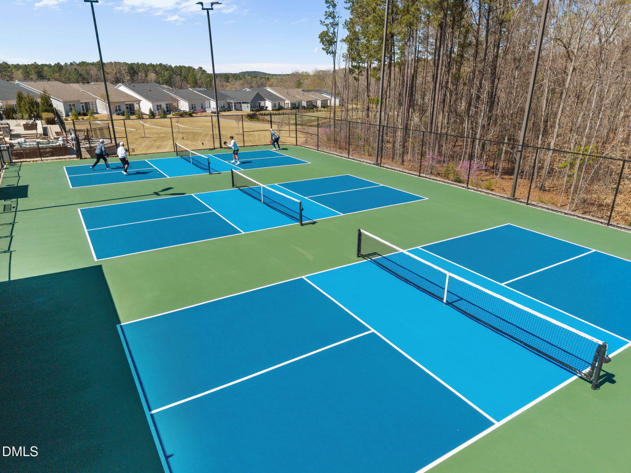 162 Desert Sand Lane Raleigh, NC 27610 - Photo 27 of 33 a view of an outdoor space and tennis court