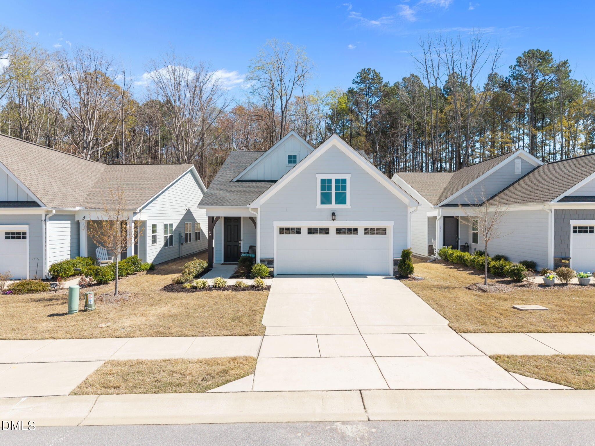 162 Desert Sand Lane Raleigh, NC 27610 - Photo 3 of 33 a house with trees in the background