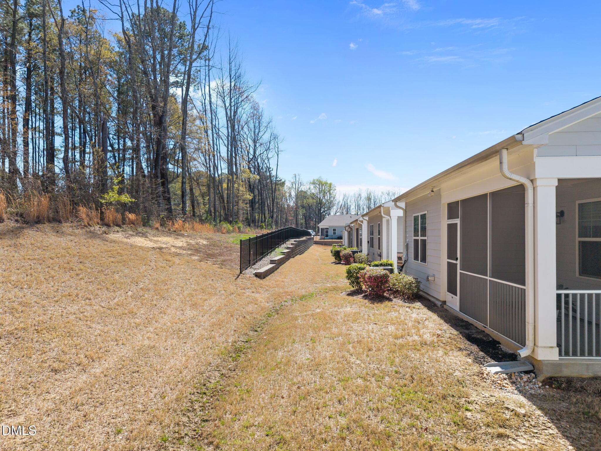 162 Desert Sand Lane Raleigh, NC 27610 - Photo 5 of 33 a view of the back yard of the house