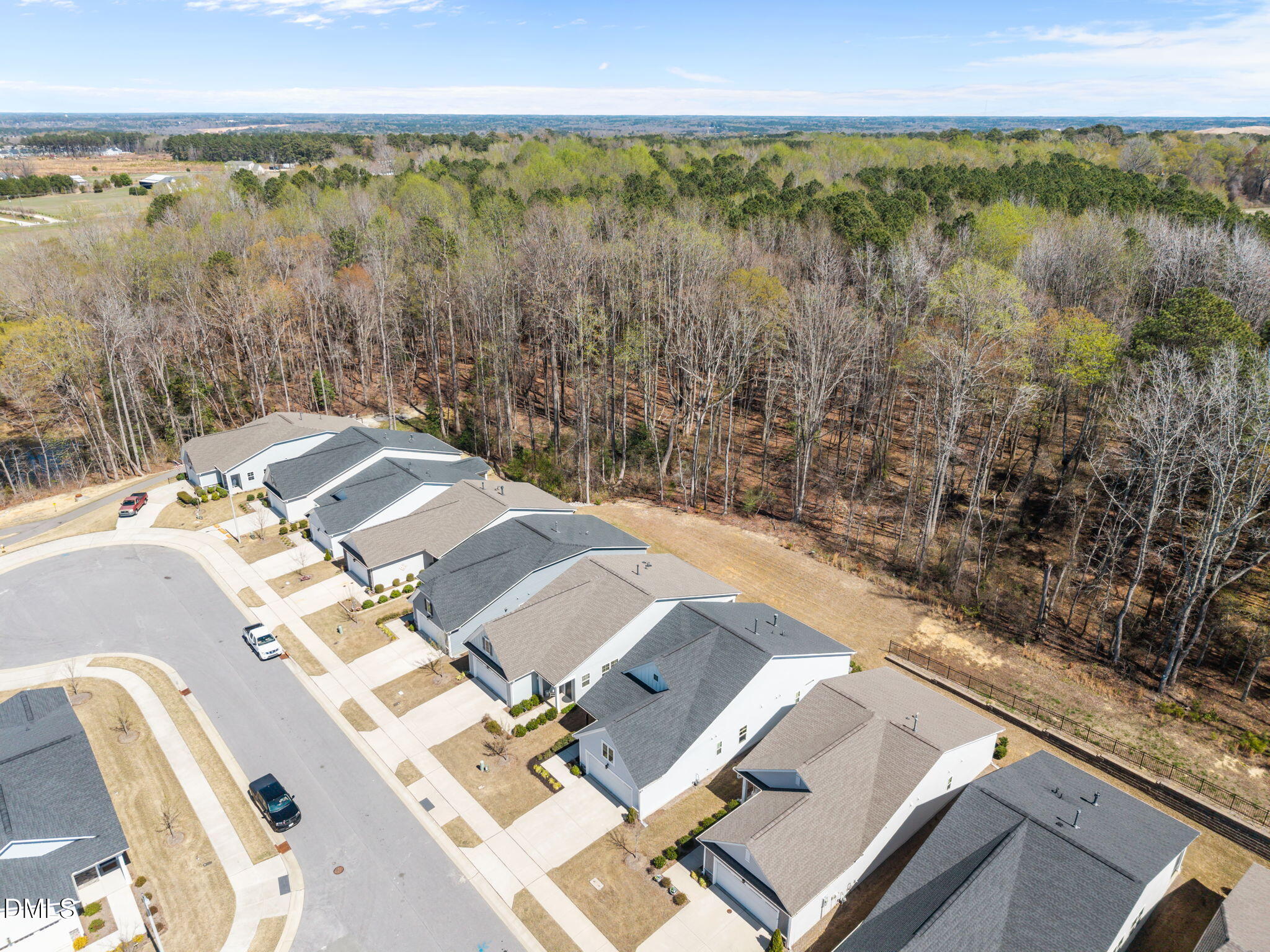 162 Desert Sand Lane Raleigh, NC 27610 - Photo 6 of 33 a view of a city with an outdoor seating