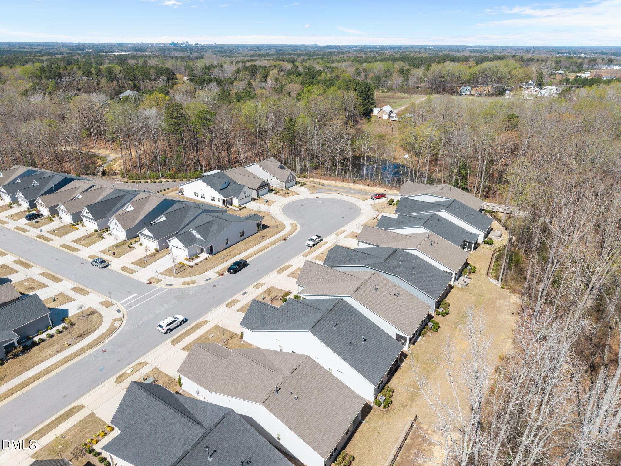 162 Desert Sand Lane Raleigh, NC 27610 - Photo 7 of 33 a view of a city with water view