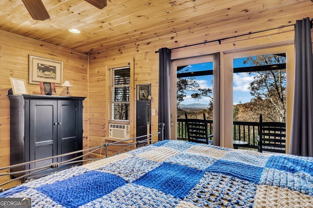 116 Channing Ridge Road, Unit 10 Morganton, GA 30560 - Photo 17 of 62 a bedroom with a bed dresser and a window