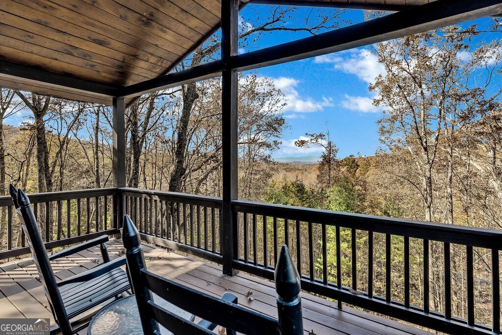 116 Channing Ridge Road, Unit 10 Morganton, GA 30560 - Photo 23 of 62 a view of a two chair in the balcony