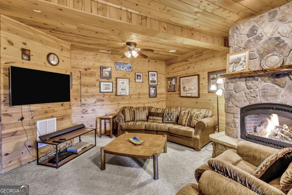 116 Channing Ridge Road, Unit 10 Morganton, GA 30560 - Photo 35 of 63 a living room with furniture and a flat screen tv