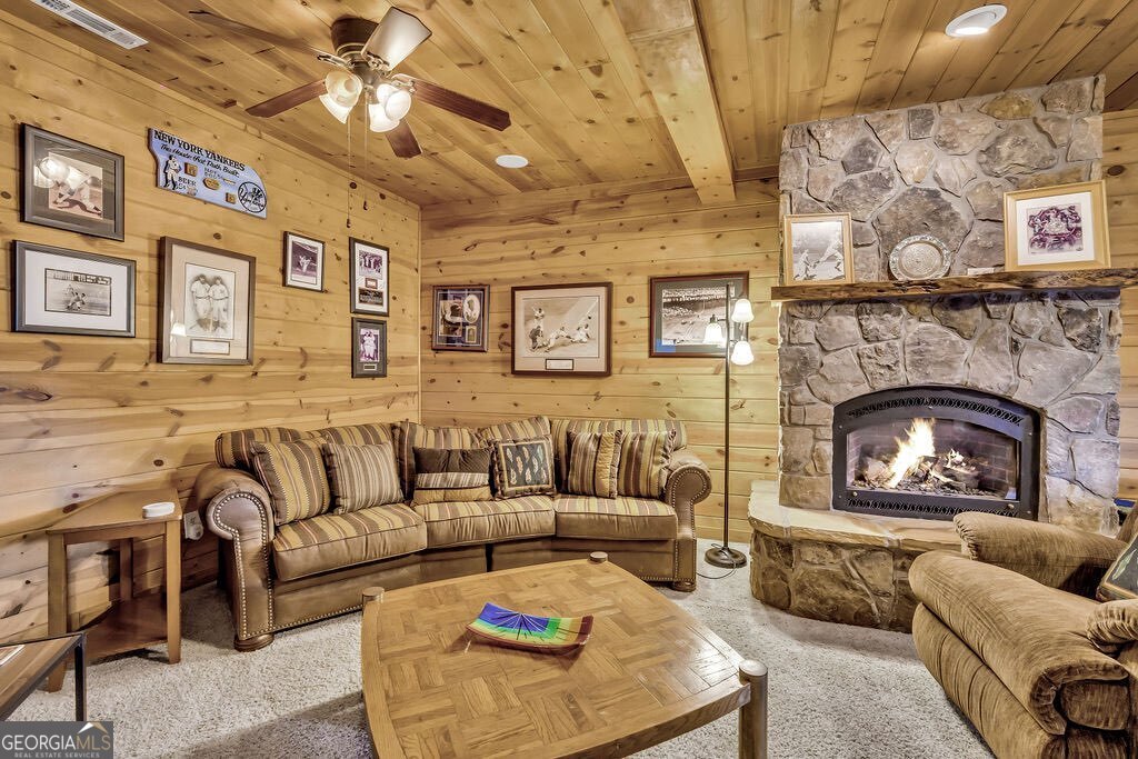 116 Channing Ridge Road, Unit 10 Morganton, GA 30560 - Photo 36 of 62 a living room with furniture and a fireplace