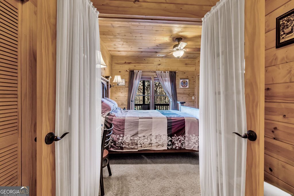 116 Channing Ridge Road, Unit 10 Morganton, GA 30560 - Photo 38 of 63 a living room with furniture and a window