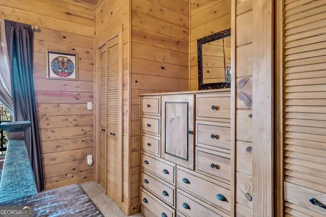 a living room with furniture a fireplace and a table