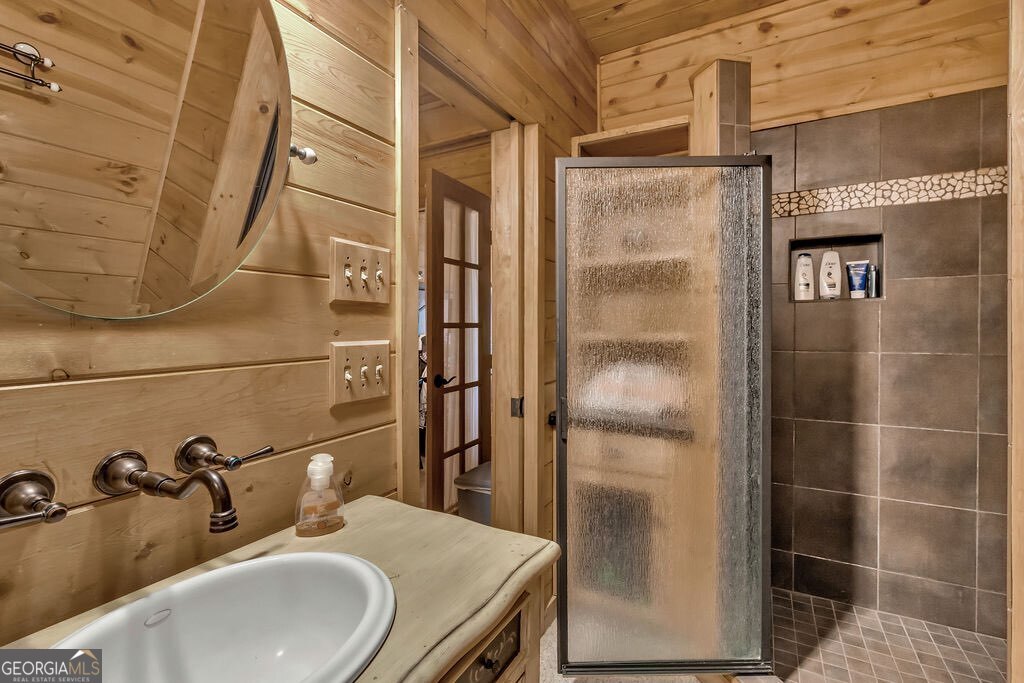 116 Channing Ridge Road, Unit 10 Morganton, GA 30560 - Photo 42 of 62 a bathroom with a sink and mirror