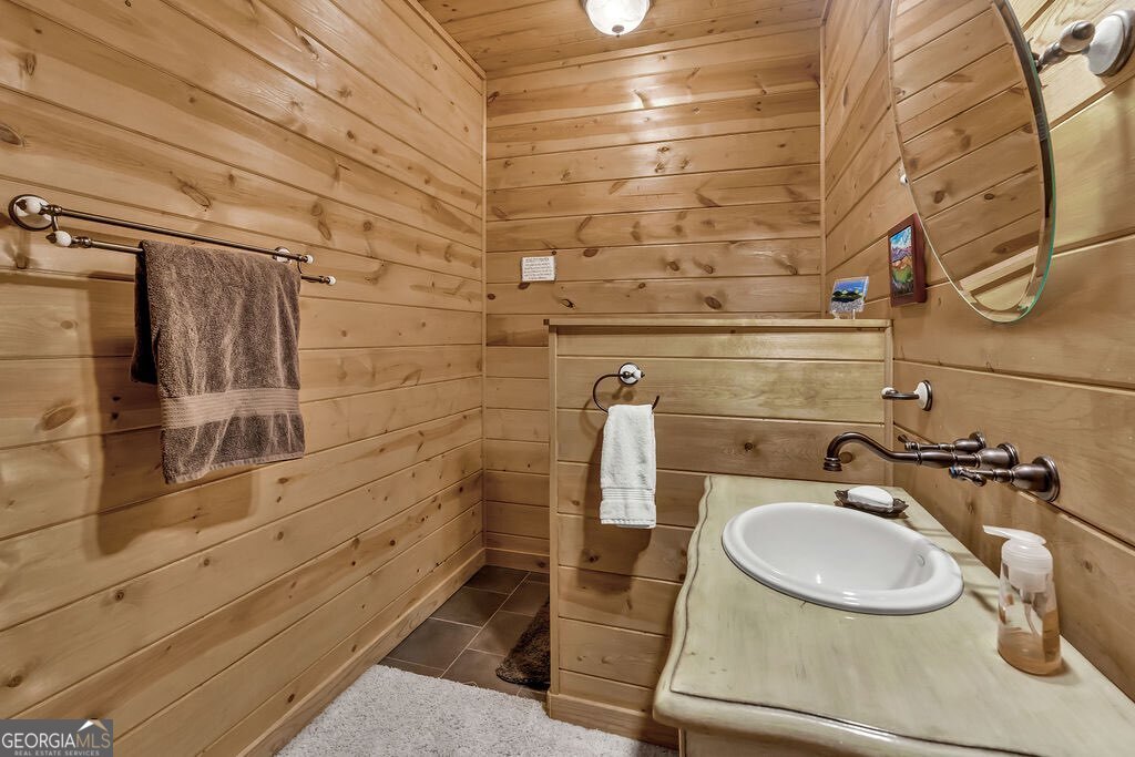 116 Channing Ridge Road, Unit 10 Morganton, GA 30560 - Photo 42 of 63 a bathroom with a sink and a mirror