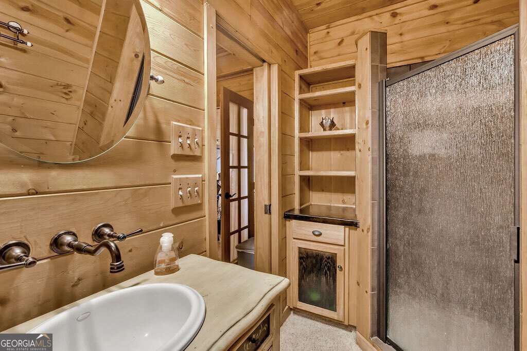 116 Channing Ridge Road, Unit 10 Morganton, GA 30560 - Photo 43 of 62 a bathroom with a sink and mirror