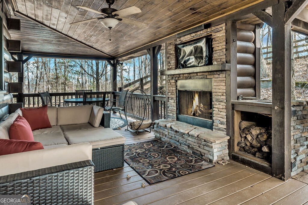 116 Channing Ridge Road, Unit 10 Morganton, GA 30560 - Photo 49 of 62 a living room with furniture and a fireplace